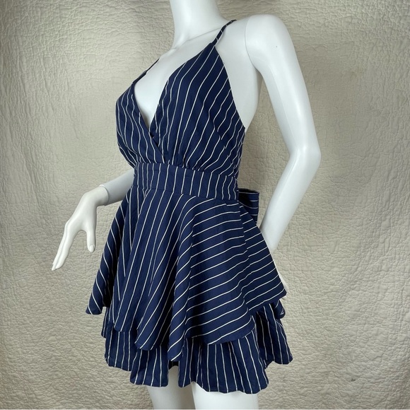 🔥Lulus Ruffle & Flow Black Striped Backless Ruffle
Romper Blue White - Picture 3 of 16